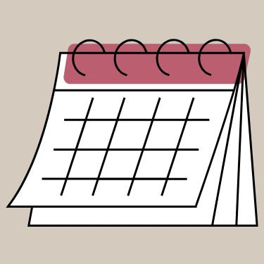 Illustration of a calendar with a pink cover on a beige background